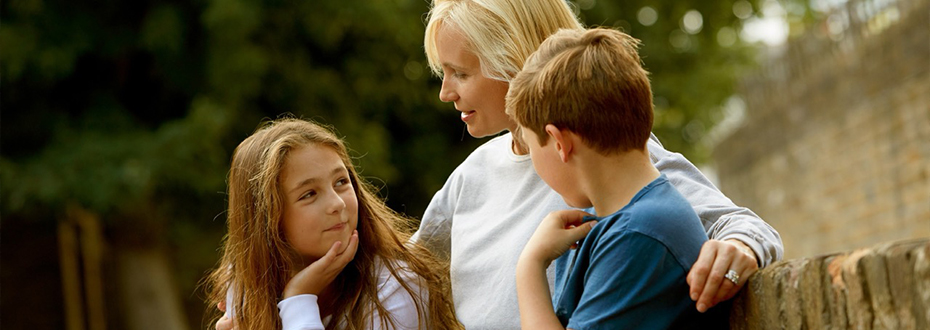 photo of a mother with two children